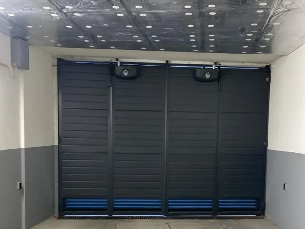 Portão de garagem com mola de torção